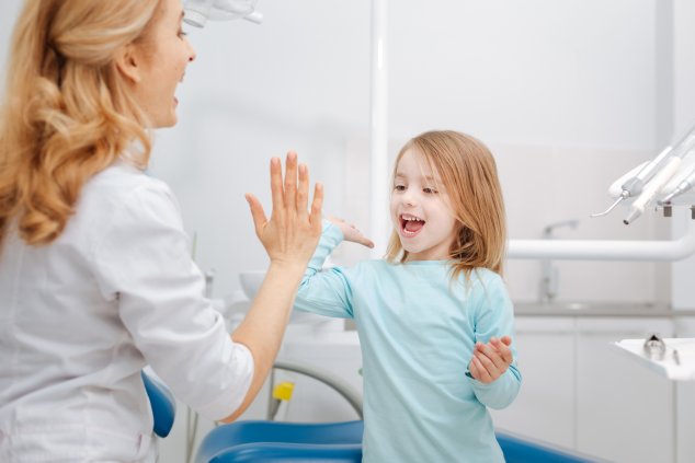 doctor child high five