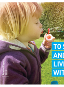 Asthma Society of Ireland Annual Report 2015 Cover with Girl Blowing Bubbles