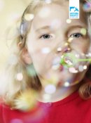 Girl blowing bubbles